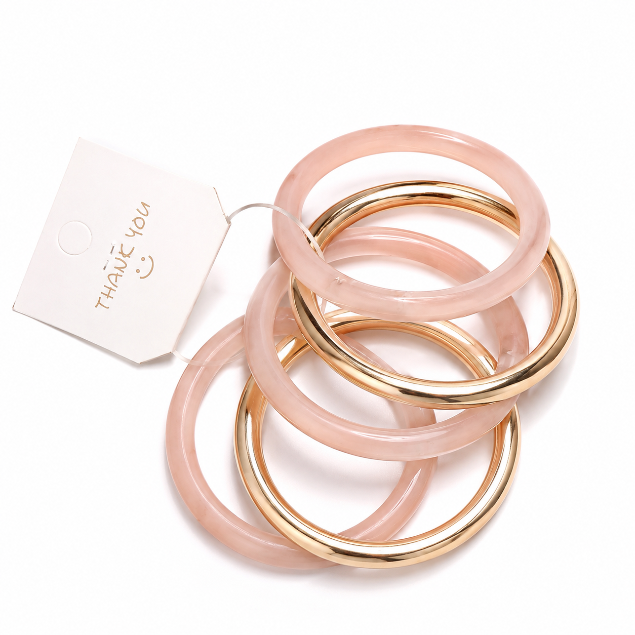 Blush gold stack bangles